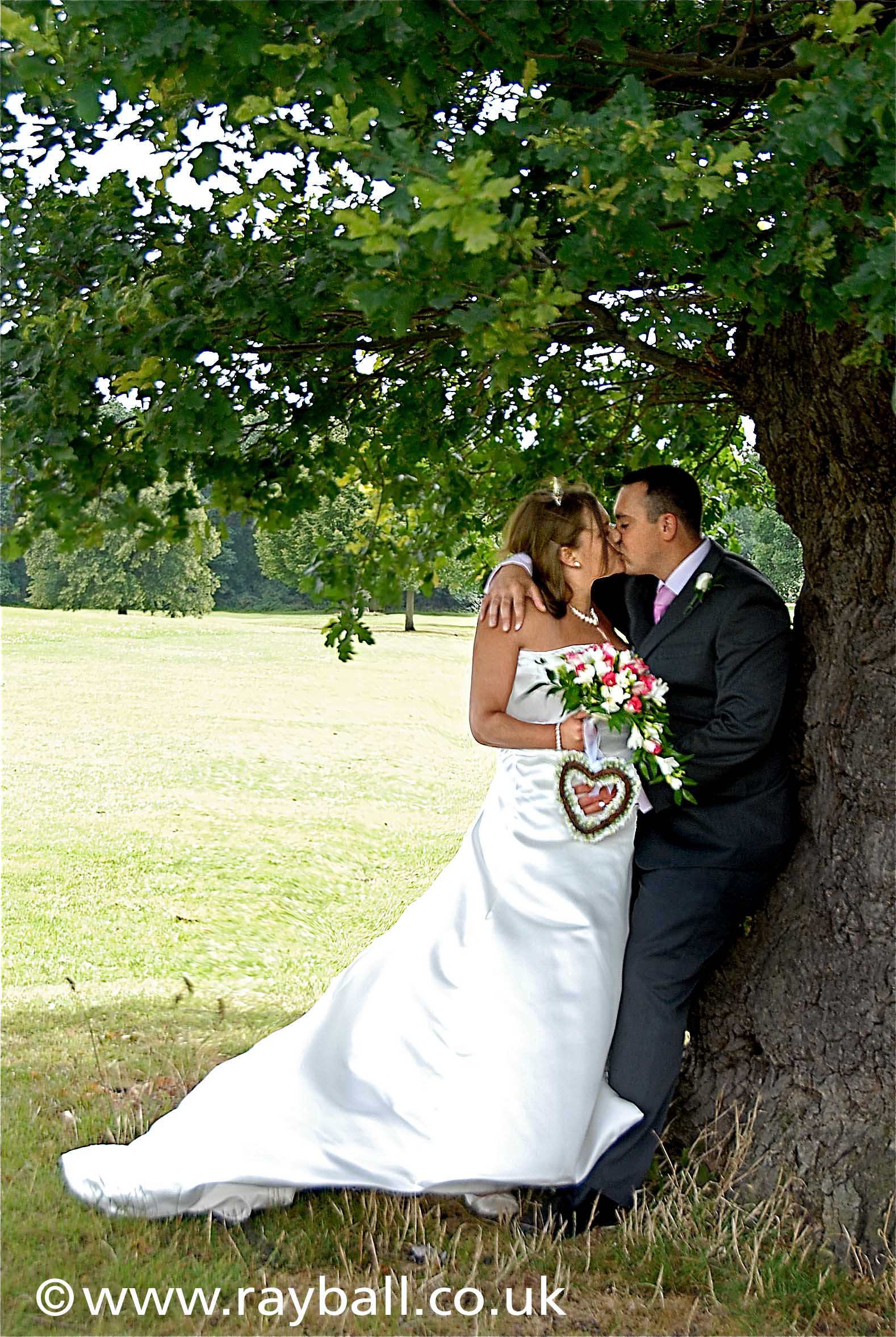 Mitcham couple Just married photographed in Morden Park, London by Epsom Photography Surrey.